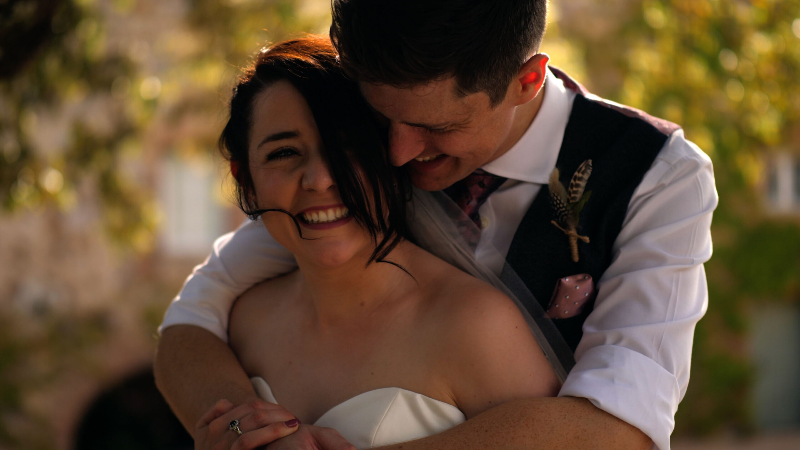 Beth and Steve share a cuddle together at Villa Podernovo. Beth is all smiles on her wedding day, looking up at the light.